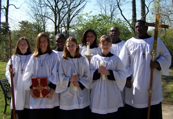 Acolytes and Youth Minister John Daniels and acolytes before the Easter service